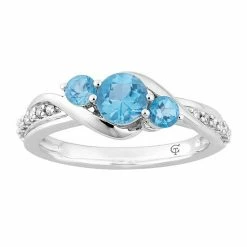 Wholesale 🥰 Unbranded 10k White Gold Swiss Blue Topaz & 1/10 Carat T.W. Diamond 3-Stone Ring 🧨